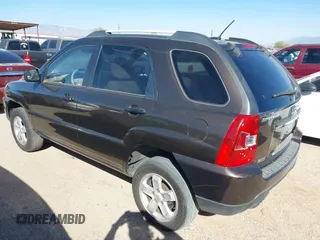 2010 Kia Sportage LX with VIN KNDKGCA32A7666414, listed as a IAAI auction lot 41598263 with 166,882 mi miles and . Bid and sale history available at carsss.com. Image 3.