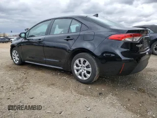 2023 Toyota Corolla LE with VIN 5YFB4MDE0PP070916, listed as a Copart auction lot 49873085 with 52,005 mi miles and Salvage Title. Bid and sale history available at carsss.com. Image 2.