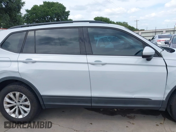 2018 Volkswagen Tiguan S with VIN 3VV1B7AX0JM092116, listed as a IAAI auction lot 42388339 with 103,412 mi miles and . Bid and sale history available at DreamBid. Image 13.
