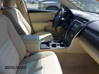 2016 Toyota Camry XLE with VIN 4T1BF1FKXGU606006, listed as a IAAI auction lot 42058339 with 94,058 mi miles. Bid and sale history available at carsss.com. Image 5.