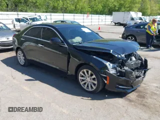 2018 Cadillac ATS AWD with VIN 1G6AE5RX1J0152750, listed as a IAAI auction lot 42239481 with 51,591 mi miles and . Bid and sale history available at DreamBid. Image 1.