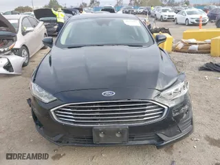 2020 Ford Fusion Hybrid SE with VIN 3FA6P0LU5LR267231, listed as a IAAI auction lot 41778162 with 76,817 mi miles. Bid and sale history available at carsss.com. Image 12.