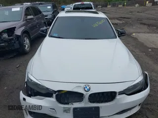 2014 BMW 3 Series 328i xDrive with VIN WBA3B5C56EP544400, listed as a IAAI auction lot 42172100 with 242,472 mi miles. Bid and sale history available at carsss.com. Image 12.