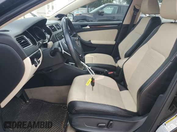 2015 Volkswagen Jetta SEL z VIN 3VWL17AJ2FM281957, wystawiony jako Copart lot #65836185 z przebiegiem 82 478 mil mil oraz Czysty tytuł • Clean title. Historia ofert i sprzedaży dostępna na DreamBid. Obrazek 7.