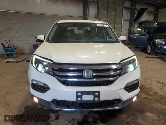 2017 Honda Pilot Elite with VIN 5FNYF6H08HB005758, listed as a Copart auction lot 53655725 with 124,218 mi miles and Salvage Title. Bid and sale history available at DreamBid. Image 5.