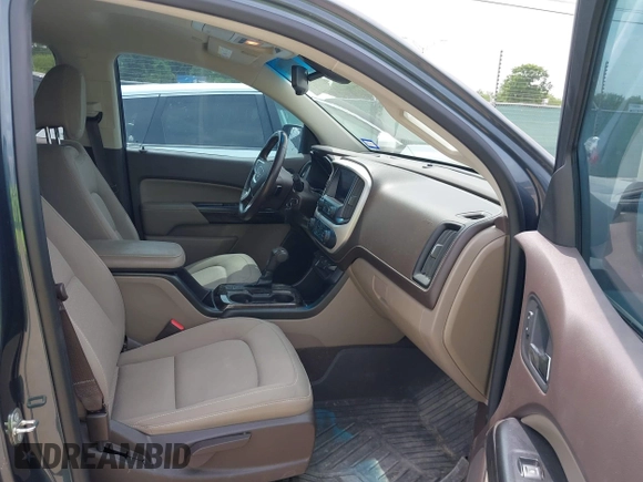 2019 GMC Canyon 4WD SLE z VIN 1GTG6CENXK1261278, wystawiony jako IAAI lot #42064295 z przebiegiem 51 786 mil mil oraz . Historia ofert i sprzedaży dostępna na DreamBid. Obrazek 5.
