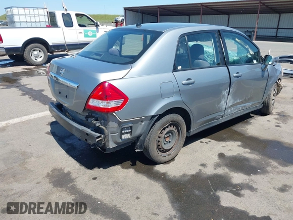 2009 Nissan Versa 1.8 S with VIN 3N1BC11E09L449780, listed as a IAAI auction lot 42034977 with 180,680 mi miles. Bid and sale history available at carsss.com. Image 4.