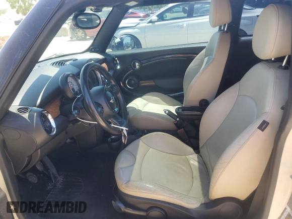 2011 MINI Hardtop with VIN WMWSU3C58BT182034, listed as a Copart auction lot 57964385 with 95,072 mi miles and Clean title. Bid and sale history available at DreamBid. Image 7.