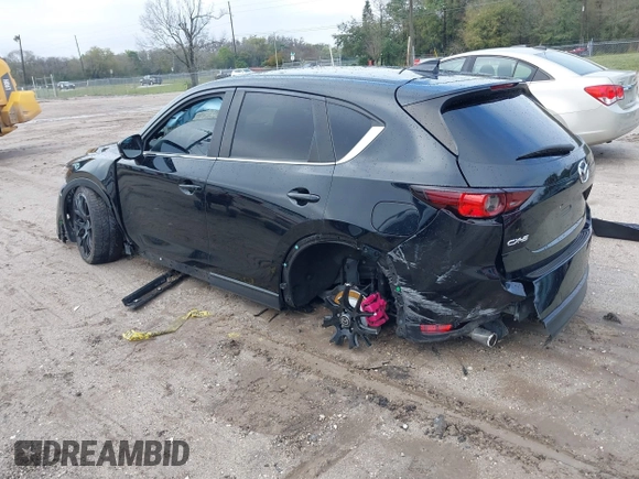 2019 Mazda CX-5 Touring with VIN JM3KFACM0K0692007, listed as a IAAI auction lot 41645657 with 1 mi miles. Bid and sale history available at carsss.com. Image 3.