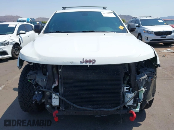 2019 Jeep Grand Cherokee Trailhawk with VIN 1C4RJFLT7KC751143, listed as a IAAI auction lot 42749406 with 54,024 mi miles and . Bid and sale history available at DreamBid. Image 13.