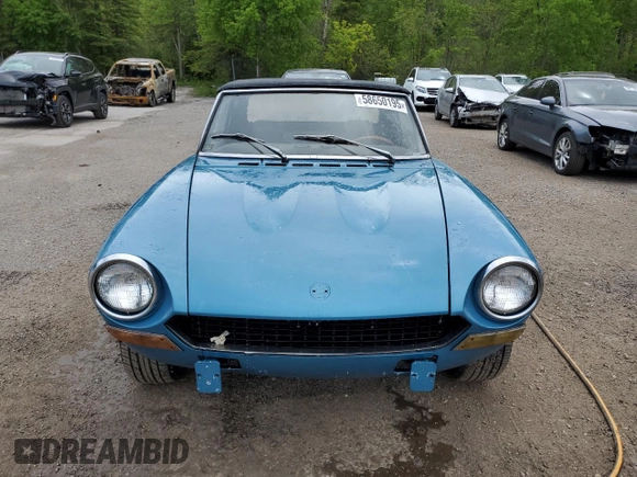 1974 FIAT 124 Spider z VIN 124CS10081683, wystawiony jako Copart lot #58650195 z przebiegiem 143 647 mil mil oraz Czysty tytuł • Clean title. Historia ofert i sprzedaży dostępna na DreamBid. Obrazek 5.