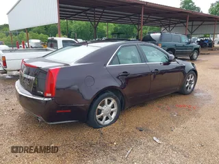 2008 Cadillac CTS RWD z VIN 1G6DF577680213369, wystawiony jako IAAI lot #42165154 z przebiegiem 248 369 mil mil oraz . Historia ofert i sprzedaży dostępna na DreamBid. Obrazek 4.
