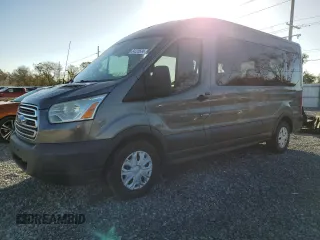 2015 Ford Transit Passenger XL with VIN 1FBAX2CGXFKA15126, listed as a Copart auction lot 84225534 with 134,178 mi miles and Salvage Title. Bid and sale history available at carsss.com. Image 1.
