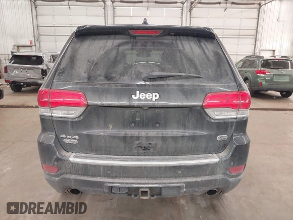 2014 Jeep Grand Cherokee Overland with VIN 1C4RJFCG8EC177899, listed as a IAAI auction lot 41695290 with 200,867 mi miles and . Bid and sale history available at DreamBid. Image 17.