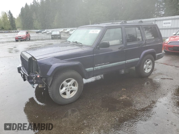1999 Jeep Cherokee Sport with VIN 1J4FF68S6XL602177, listed as a Copart auction lot 51962355 with 176,386 mi miles and Salvage Title. Bid and sale history available at carsss.com. Image 1.