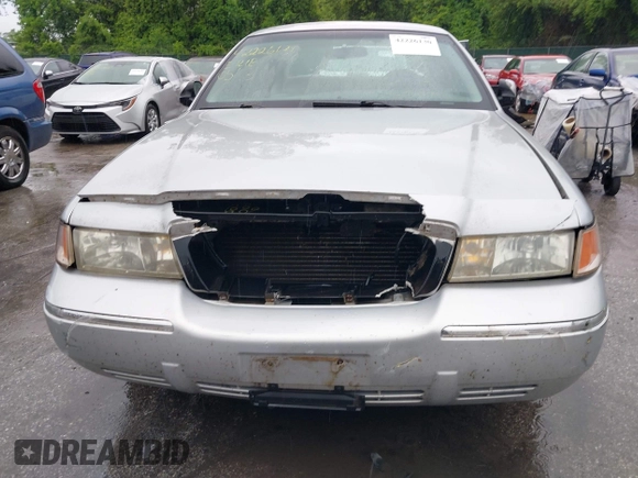 2001 Mercury Grand Marquis GS z VIN 2MEFM74W91X618246, wystawiony jako IAAI lot #42226130 z przebiegiem 125 487 mil mil oraz . Historia ofert i sprzedaży dostępna na DreamBid. Obrazek 6.