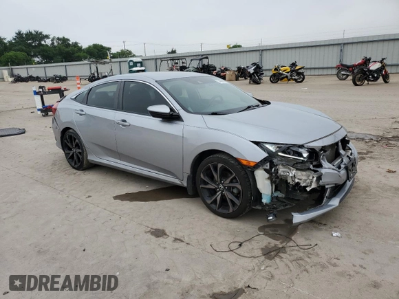 2019 Honda Civic Sport with VIN 19XFC2F80KE031091, listed as a Copart auction lot 54488535 with 68,106 mi miles and Salvage title. Bid and sale history available at DreamBid. Image 4.