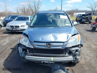 2009 Honda CR-V EX-L with VIN 5J6RE48799L065209, listed as a IAAI auction lot 41868398 with 111,385 mi miles. Bid and sale history available at carsss.com. Image 12.