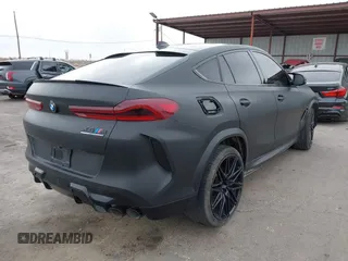 2021 BMW X6 M with VIN 5YMCY0C01M9F58498, listed as a IAAI auction lot 41272745 with 29,769 mi miles. Bid and sale history available at carsss.com. Image 4.