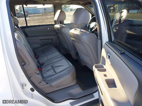 2013 Honda Pilot Touring with VIN 5FNYF4H96DB042451, listed as a IAAI auction lot 41561239 with 163,392 mi miles. Bid and sale history available at carsss.com. Image 8.