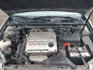 2005 Toyota Camry LE with VIN 4T1BF32K25U595176, listed as a IAAI auction lot 41932171 with 203,956 mi miles and . Bid and sale history available at DreamBid. Image 10.