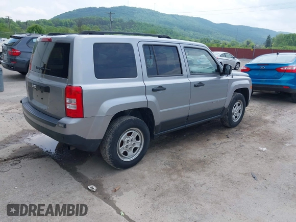 2014 Jeep Patriot Sport with VIN 1C4NJPBB7ED773445, listed as a IAAI auction lot 42205816 with 121,778 mi miles and . Bid and sale history available at DreamBid. Image 4.