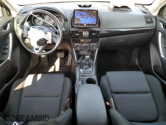2014 Mazda CX-5 Sport z VIN JM3KE4BE1E0359446, wystawiony jako Copart lot #54562545 z przebiegiem 128 150 mil mil oraz Szkoda całkowita • Salvage title. Historia ofert i sprzedaży dostępna na DreamBid. Obrazek 8.