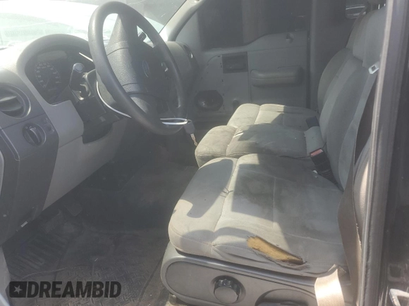 2004 Ford F-150 XL with VIN 1FTRF12W64NA28259, listed as a Copart auction lot 62601685 with 217,906 mi miles and Salvage title. Bid and sale history available at DreamBid. Image 7.