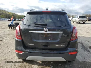 2020 Buick Encore Essence z VIN KL4CJGSB3LB033577, wystawiony jako Copart lot #53960845 z przebiegiem 57 581 mil mil oraz Szkody całkowita. Historia ofert i sprzedaży dostępna na DreamBid. Obrazek 6.