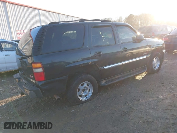 2003 GMC Yukon SLT with VIN 1GKEC13Z53R279530, listed as a IAAI auction lot 41451412 with 308,872 mi miles. Bid and sale history available at carsss.com. Image 4.