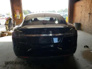 2014 Tesla Model S 60 with VIN 5YJSA1H16EFP43523, listed as a Copart auction lot 63291145 with Not provided miles and Clean title. Bid and sale history available at DreamBid. Image 6.
