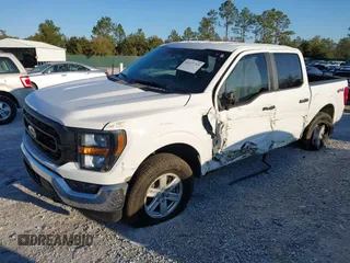 2023 Ford F-150 XL with VIN 1FTEW1EP0PKD78656, listed as a IAAI auction lot 41277719 with 21,825 mi miles. Bid and sale history available at carsss.com. Image 2.