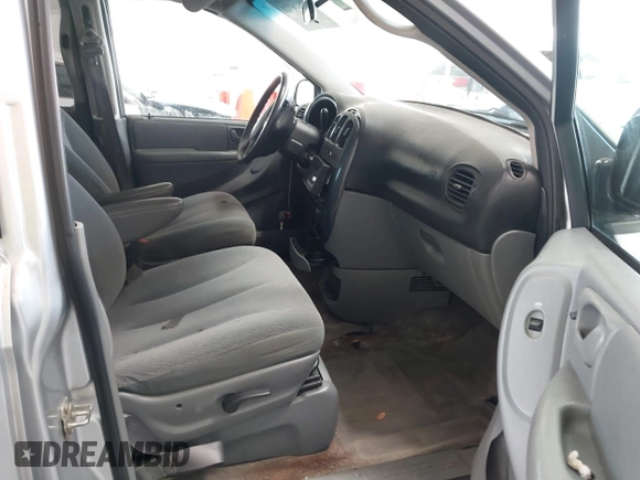 2005 Dodge Caravan SXT with VIN 2D4GP44L65R335656, listed as a IAAI auction lot 42526728 with 322,176 mi miles and . Bid and sale history available at DreamBid. Image 5.
