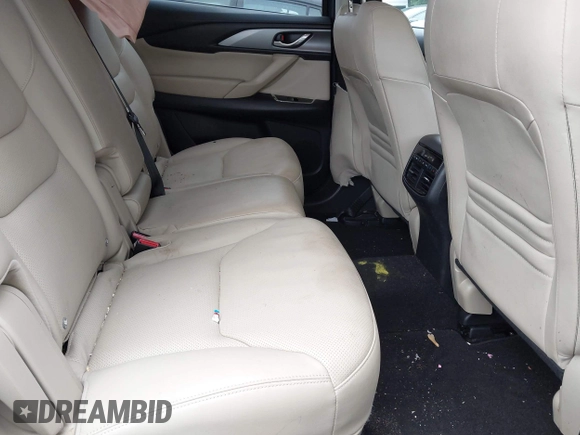 2019 Mazda CX-9 Touring with VIN JM3TCBCY6K0334898, listed as a IAAI auction lot 42467677 with 69,454 mi miles and . Bid and sale history available at DreamBid. Image 8.