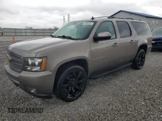 2013 Chevrolet Suburban LT with VIN 1GNSKJE77DR131188, listed as a Copart auction lot 52880375 with 147,278 mi miles and Salvage Title. Bid and sale history available at DreamBid. Image 1.