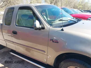 2002 Ford F-150 XL with VIN 1FTRX17242NA02789, listed as a IAAI auction lot 41832186 with 262,253 mi miles. Bid and sale history available at carsss.com. Image 13.