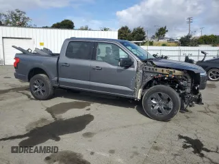 2023 Ford F-150 Lightning Pro with VIN 1FT6W1EV0PWG34788, listed as a Copart auction lot 54454805 with 11,432 mi miles and Salvage title. Bid and sale history available at DreamBid. Image 4.