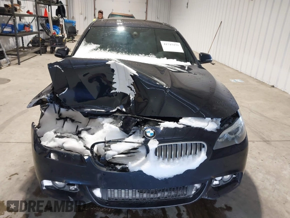 2014 BMW 5 Series 535i xDrive with VIN WBA5B3C58ED531825, listed as a IAAI auction lot 41715275 with 67,782 mi miles and . Bid and sale history available at carsss.com. Image 12.