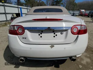 2007 Jaguar XK with VIN SAJDA44B775B05606, listed as a Copart auction lot 49419515 with 115,607 mi miles and Salvage Title. Bid and sale history available at DreamBid. Image 6.