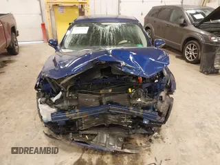2013 Ford Fusion Titanium Hybrid with VIN 3FA6P0RU9DR320909, listed as a IAAI auction lot 41477530 with 108,153 mi miles. Bid and sale history available at carsss.com. Image 6.