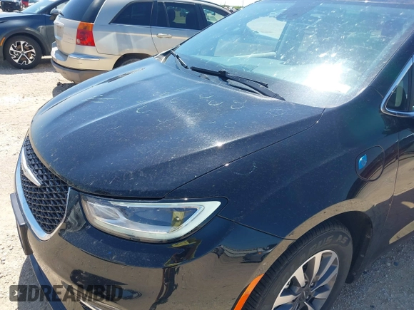 2024 Chrysler Pacifica Hybrid Select with VIN 2C4RC1S70RR169467, listed as a IAAI auction lot 42448734 with 38,062 mi miles and . Bid and sale history available at DreamBid. Image 6.