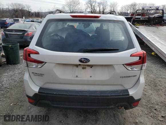 2019 Subaru Forester with VIN JF2SKACC1KH466489, listed as a Copart auction lot 52566935 with 77,411 mi miles and Salvage Title. Bid and sale history available at carsss.com. Image 6.