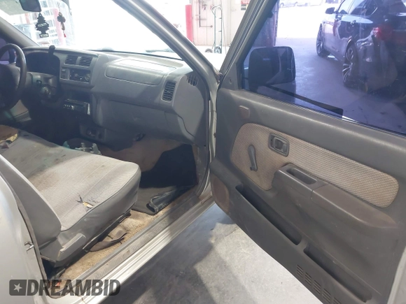 1998 Nissan Frontier XE with VIN 1N6DD21S9WC331083, listed as a IAAI auction lot 42202743 with 205,221 mi miles and . Bid and sale history available at DreamBid. Image 5.