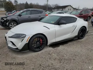 2022 Toyota Supra 3.0 z VIN WZ1DB0C00NW047378, wystawiony jako Copart lot #78797403 z przebiegiem 14 113 mil mil oraz . Historia ofert i sprzedaży dostępna na DreamBid. Obrazek 1.