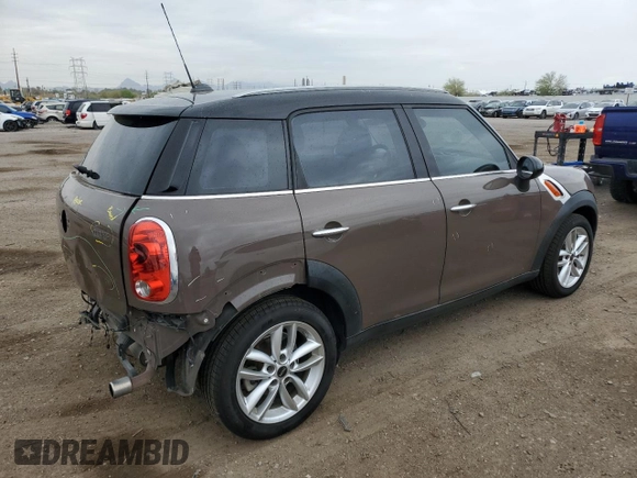 2013 MINI Countryman z VIN WMWZB3C53DWM31457, wystawiony jako Copart lot #55528885 z przebiegiem 137 279 mil mil oraz Szkoda całkowita • Salvage title. Historia ofert i sprzedaży dostępna na DreamBid. Obrazek 3.