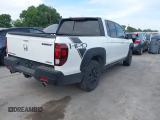 2023 Honda Ridgeline Black Edition with VIN 5FPYK3F84PB011792, listed as a IAAI auction lot 42049593 with 21,002 mi miles and . Bid and sale history available at DreamBid. Image 4.