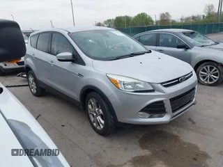2013 Ford Escape SEL with VIN 1FMCU0HX1DUB81641, listed as a IAAI auction lot 42090788 with 111,496 mi miles and . Bid and sale history available at DreamBid. Image 1.