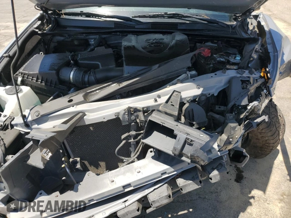 2020 Toyota Tacoma SR5 z VIN 3TMDZ5BN0LM094976, wystawiony jako Copart lot #58695515 z przebiegiem 84 025 mil mil oraz Czysty tytuł • Clean title. Historia ofert i sprzedaży dostępna na DreamBid. Obrazek 11.