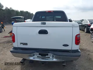 2003 Ford F-150 XLT with VIN 1FTRW08L73KA73945, listed as a IAAI auction lot 41474904 with 122,080 mi miles. Bid and sale history available at carsss.com. Image 17.