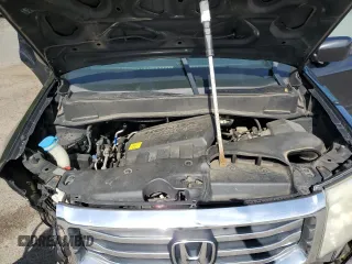 2012 Honda Pilot EX-L z VIN 5FNYF4H56CB051453, wystawiony jako Copart lot #56736035 z przebiegiem 210 201 mil mil oraz Szkoda całkowita • Salvage title. Historia ofert i sprzedaży dostępna na DreamBid. Obrazek 12.